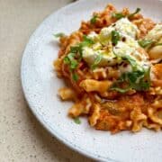 20 minute cherry tomato burrata pasta with fresh basil, burrata, and crushed red pepper flakes