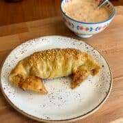 Rice paper Big Mac spiral with sesame seeds and burger sauce