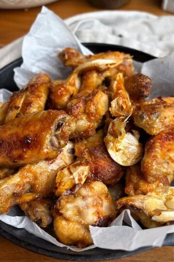 bowl of crispy maple garlic chicken wings