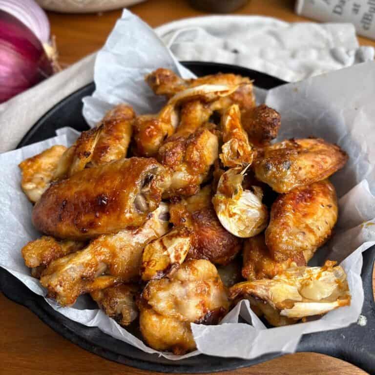 bowl of crispy maple garlic chicken wings