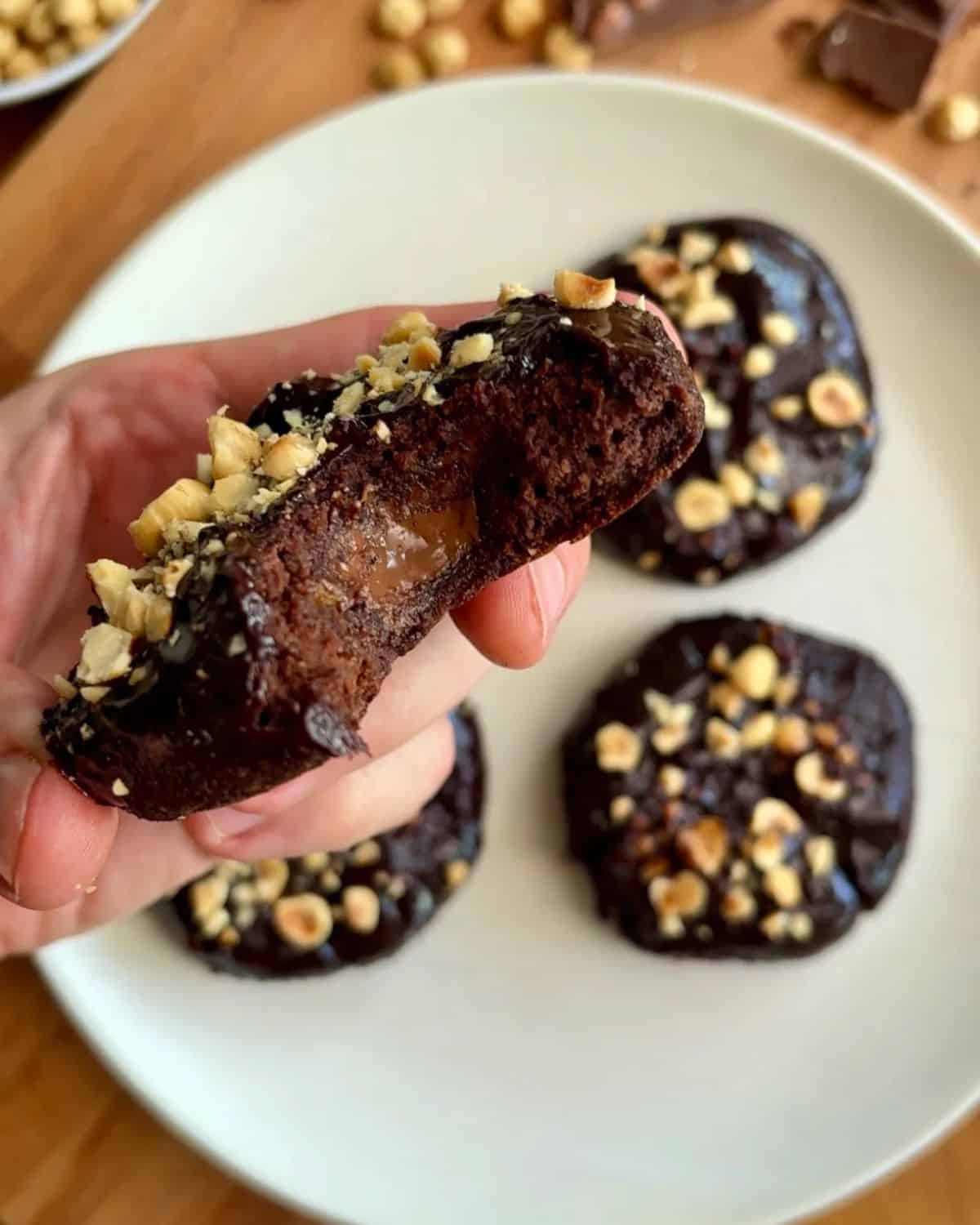 Ferrero Rocher chocolate hazelnut cookie with chocolate fudgy inside, topped with chopped hazelnuts