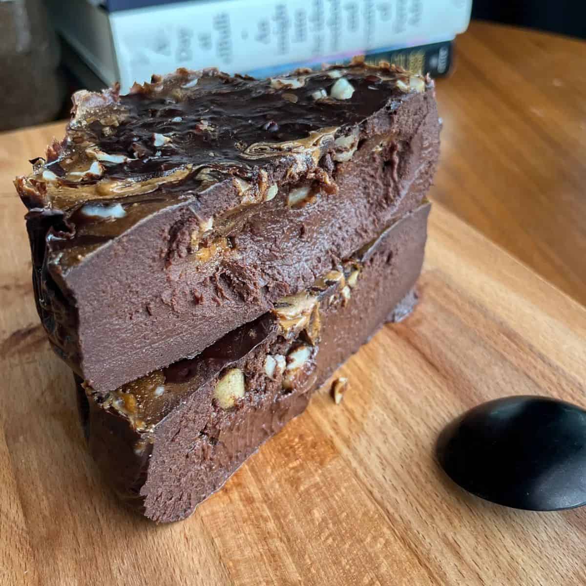 fudgy high protein ferrero rocher cheesecake topped with hazelnuts