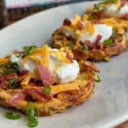fully loaded baked potato waffle topped with yogurt, cheese, green onion and turkey bacon