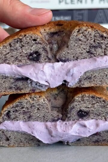 high protein blueberry bagel with blueberry cream cheese inside