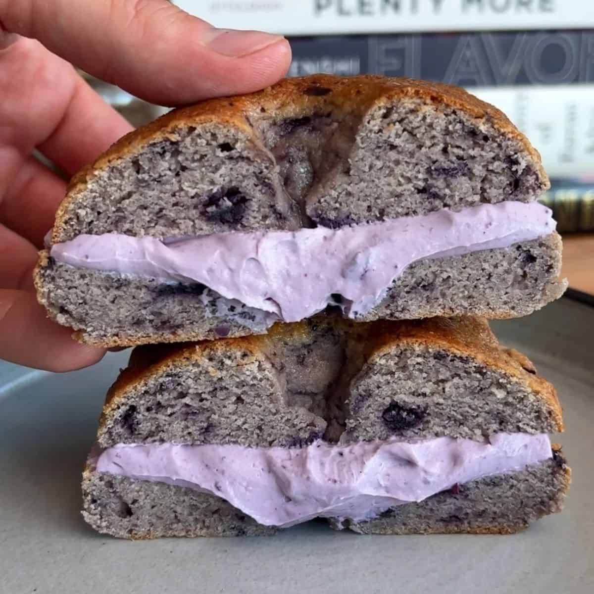 high protein blueberry bagel with blueberry cream cheese inside