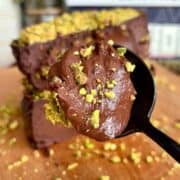 High protein chocolate pistachio dubai cheesecake with crushed pistachios