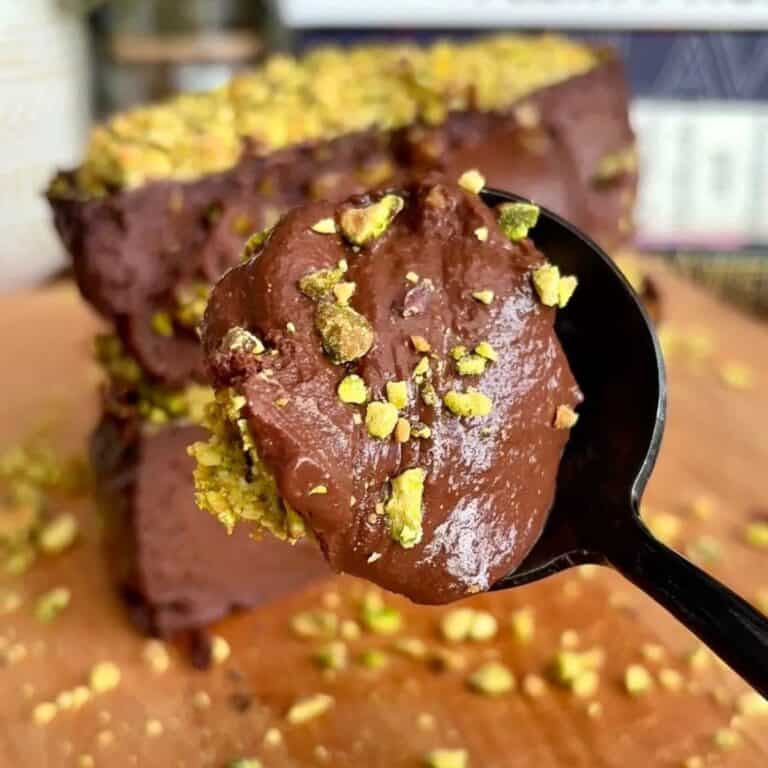 High protein chocolate pistachio dubai cheesecake with crushed pistachios