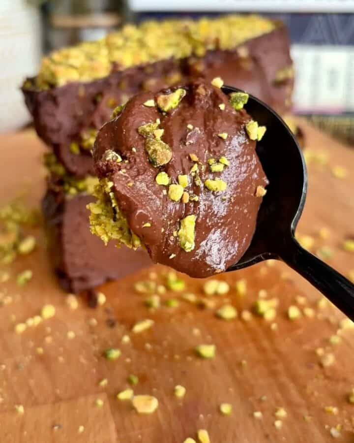 High protein chocolate pistachio dubai cheesecake with crushed pistachios and chocolate