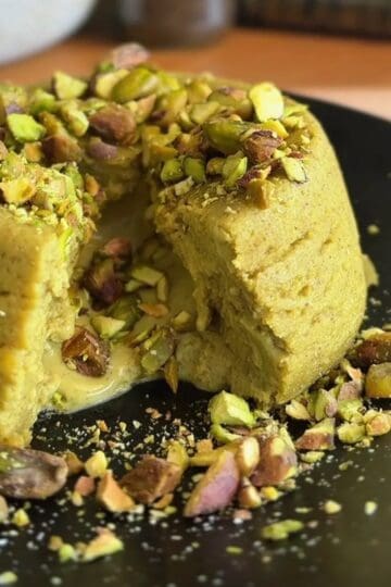 high protein microwave pistachio lava cake with chopped pistachios