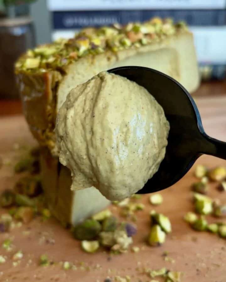 High protein pistachio cheesecake with crushed pistachio topping