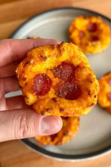 high protein pizza egg bites topped with mini pepperoni