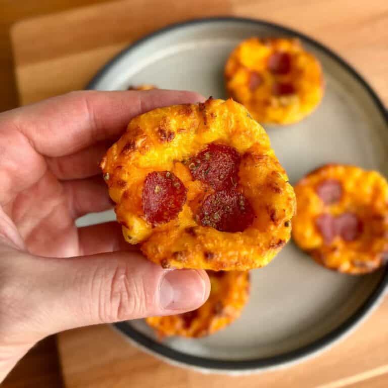 high protein pizza egg bites topped with mini pepperoni