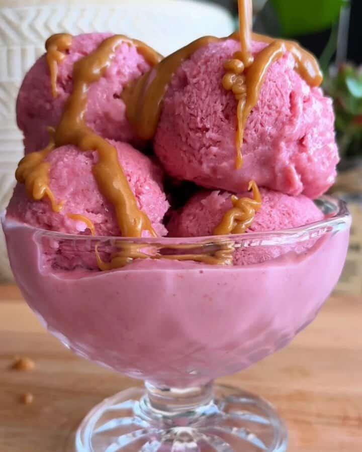 high protein strawberry ice cream sundae with caramel sauce