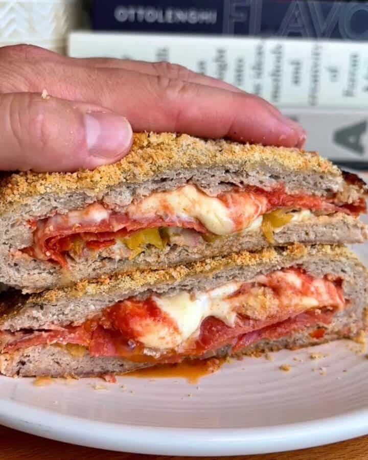 hot honey chicken crust pizza with melted cheese, sauce, and pickled jalepeno