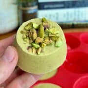 pistachio frozen yogurt cup topped with chopped pistachios