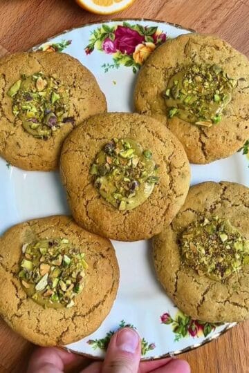 Pistachio meyer lemon cookies on a plate