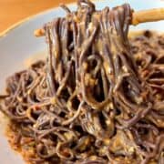 spicy sesame chili noodles with sesame seeds