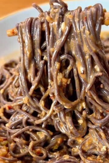 spicy sesame chili noodles with sesame seeds