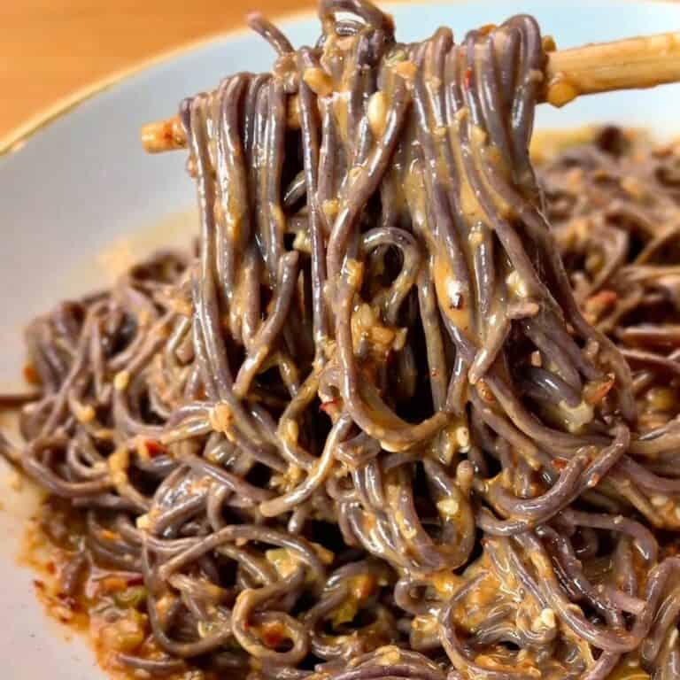 spicy sesame chili noodles with sesame seeds