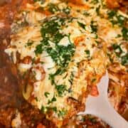 Finished piece of 30 minute one pan lasagna hack with melted cheese and meat sauce