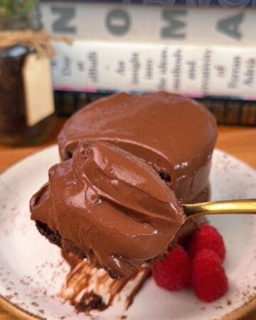 a bite of fudgy high protein chocolate cake on a fork