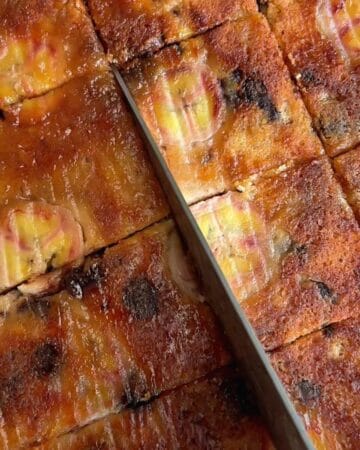 sliced gluten-free caramelized banana chocolate chunk blondies with a crispy top, fresh out of the oven