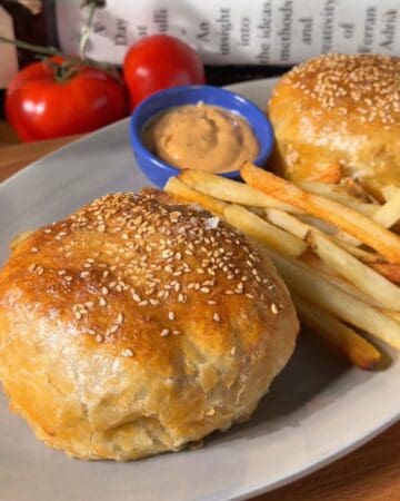 cheeseburger wellington served with crispy oven fries and burger sauce dipping