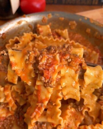 a creamy beef pasta sauce, made with fresh tomatoes, coated on noodles