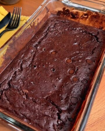 a freshly baked molten chocolate lava brownie cake, ready to be sliced