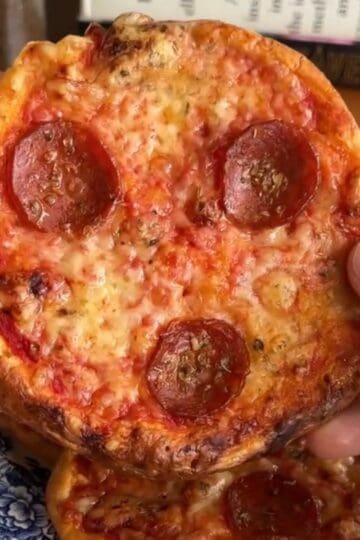 a mini pepperoni pizza made with cottage cheese crust
