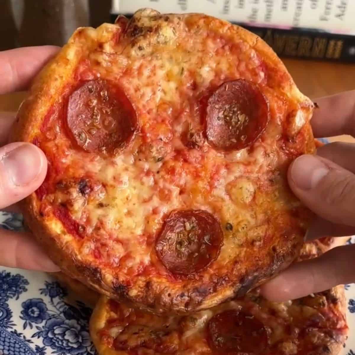 a mini pepperoni pizza made with cottage cheese crust
