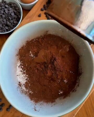 cocoa powder and vanilla folded into glossy egg white batter for brownie cookies