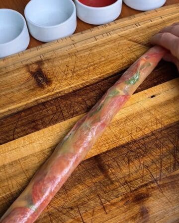 pepperoni, mozzarella, tomato sauce and basil rolled into a rice paper roll before getting spiraled