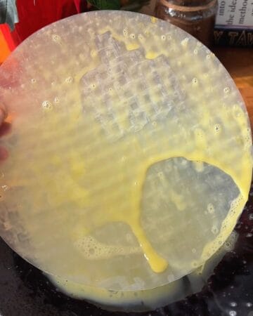 rice paper sheet dipped in egg wash for the making of a rice paper blueberry danish